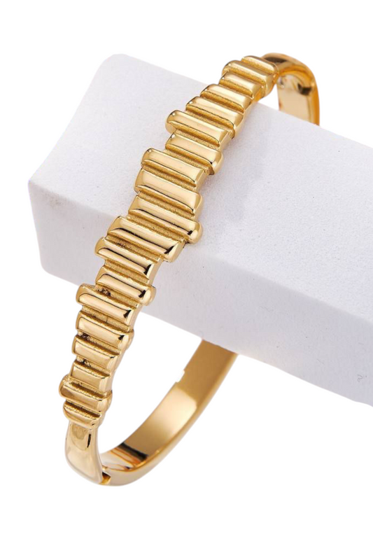 Bracelet doré design géométrique